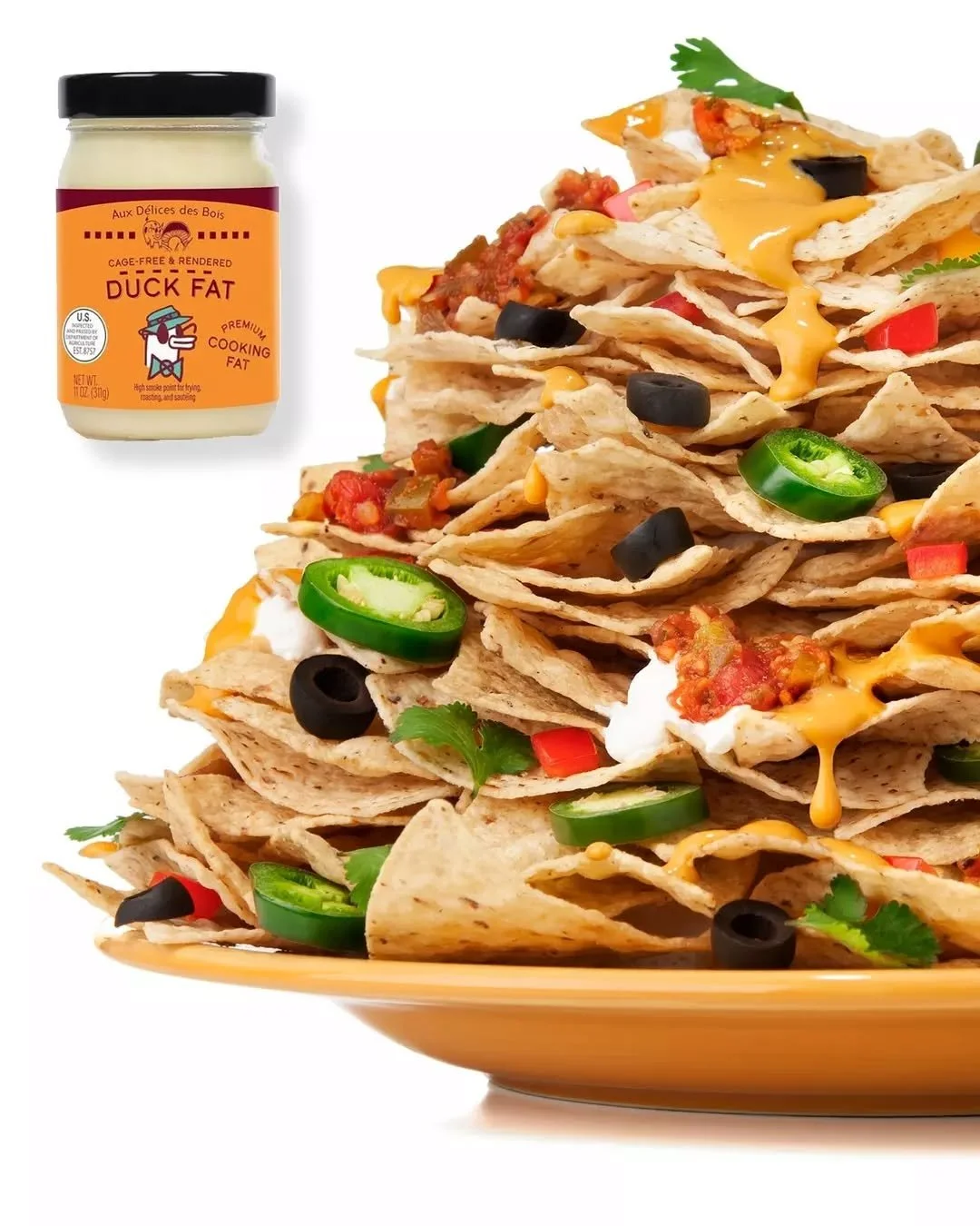 It's game time! 🏈 Cook chicken in duck fat before shredding and layering up into your nachos, for an instant flavor hit. #duckfat #chicken #superbowl #nachos #auxdelicesdesbois