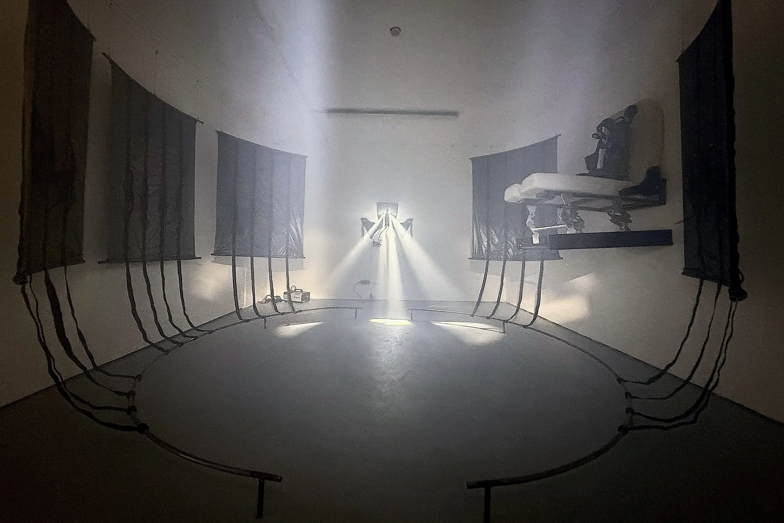 Cockpit, 2026, Conductive fabric, metal, wire casing, bolts, and hair - 180 x 345 x 345 cm