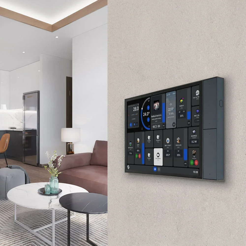 Modern living room with a wall-mounted smart home control panel beside the kitchen.