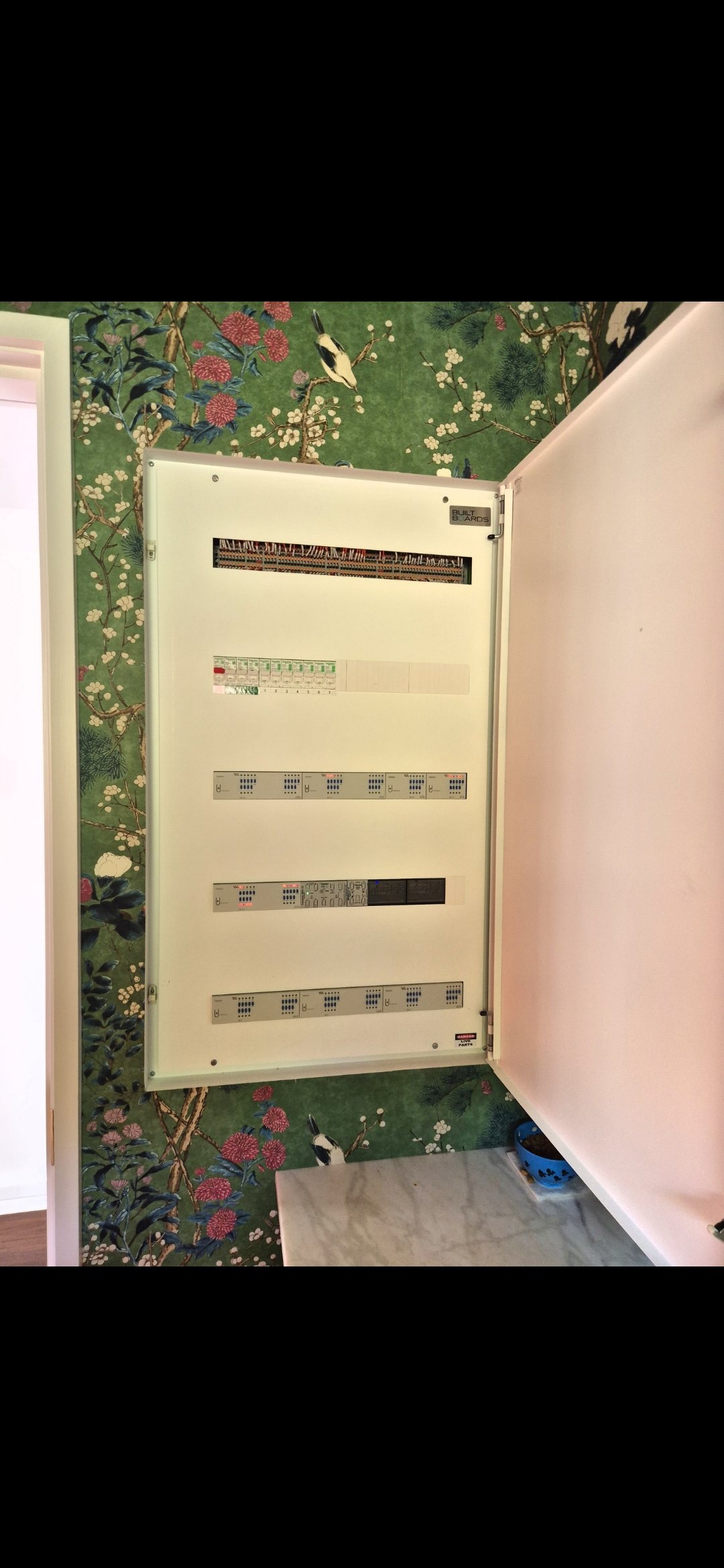 Plastered in switchboard for home with KNX automated lighting and blinds.