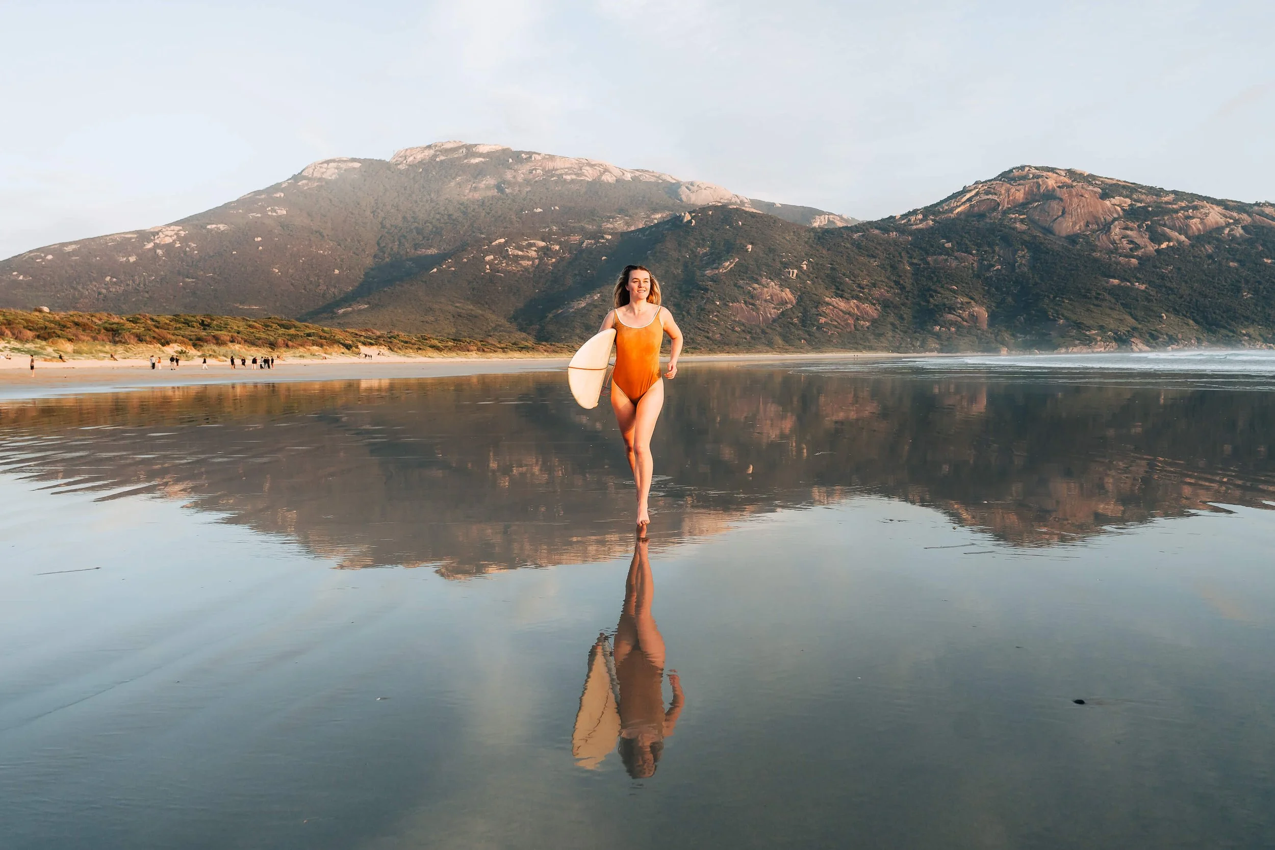 Wilsons Prom shoot surfing running with Mount oberon.jpg