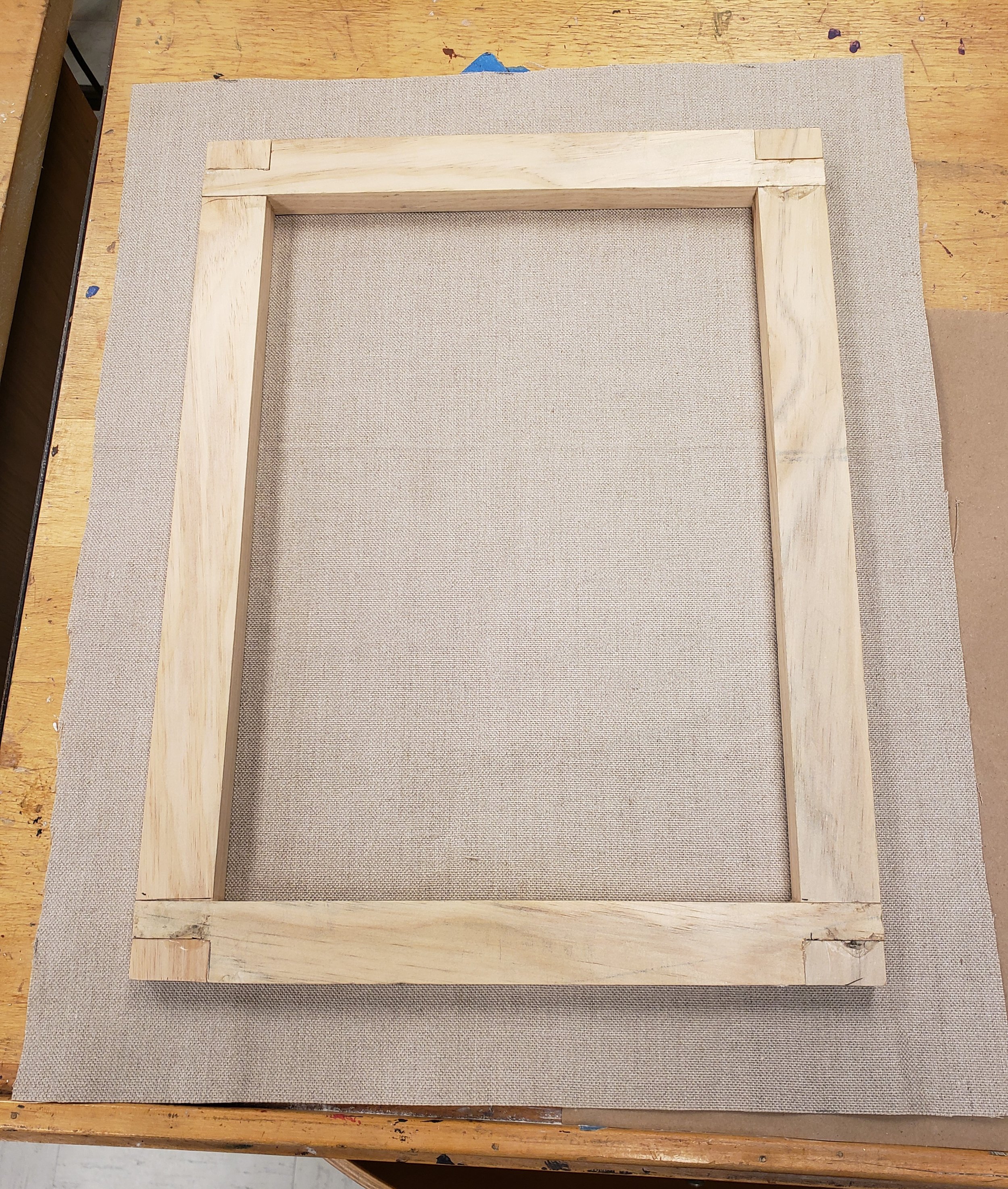 The canvas was tacked to a pine strainer featuring shouldered half-lap joins modeled after a pre-made pine strainer used by Melendez. This strainer was made by my dad, Paul Avery. The thread count of the coarse linen canvas matches that of the orig
