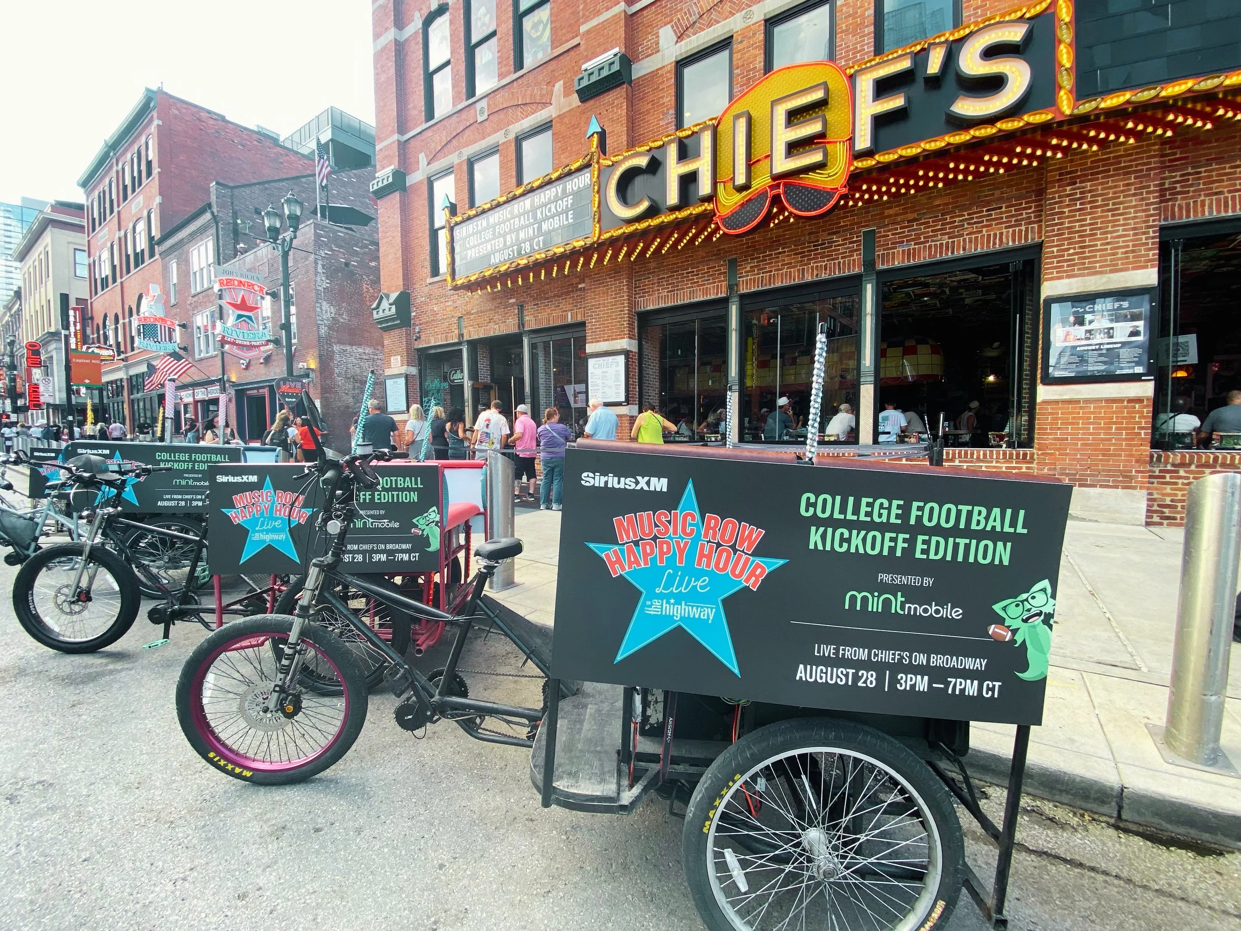 Pro Pedicab fleet with SiriusXM and Mint Mobile event branding in downtown Nashville
