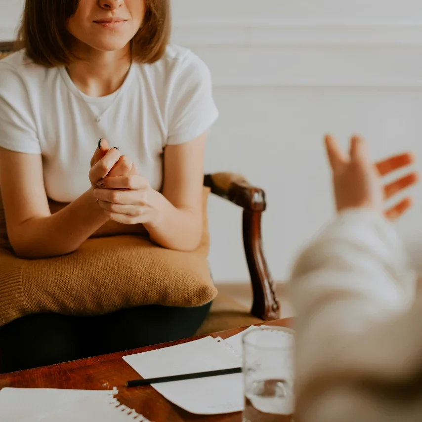 A woman in a therapist's office