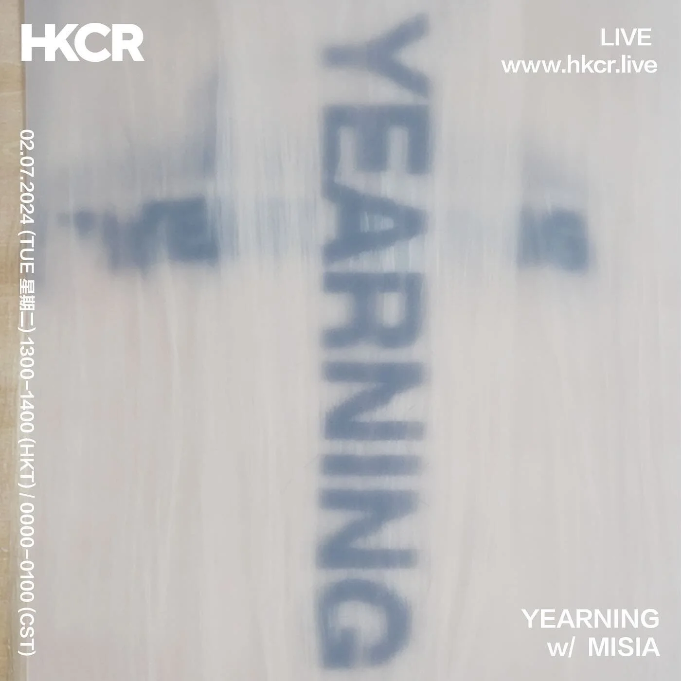 A printed poster with the words 'YEARning' and 'LIVE' appearing on it, with the text 'w/ MISIA' underneath. The poster features the word 'YEARning' in large blurry letters, and the event details including date and time in smaller text along the sides