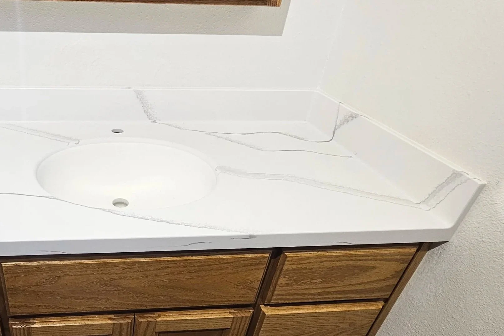 Coved backsplash keeps everything in one piece and easy to clean