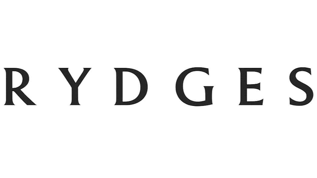 The logo of RYDGES in black 3D letters on a black background.
