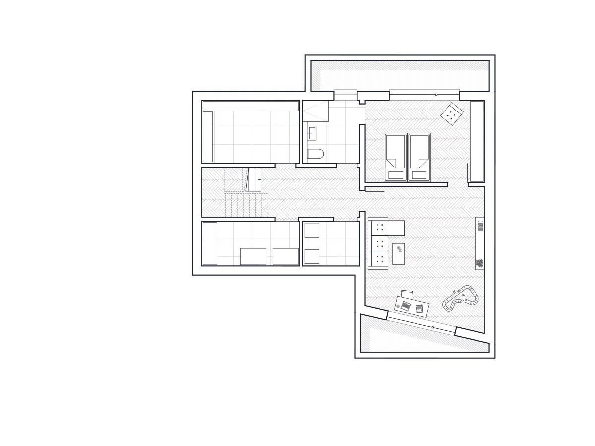 Grundriss eines Wohnhauses mit mehreren Zimmern, Küche, Badezimmer und Wohnzimmer.