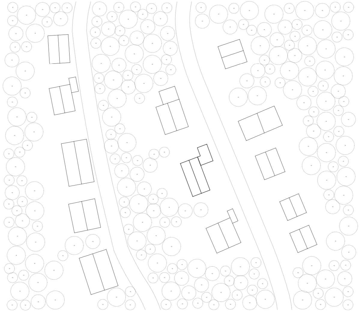 Luftbild eines Bauplans mit mehreren Gebäuden, umgeben von Bäumen und Straßen.