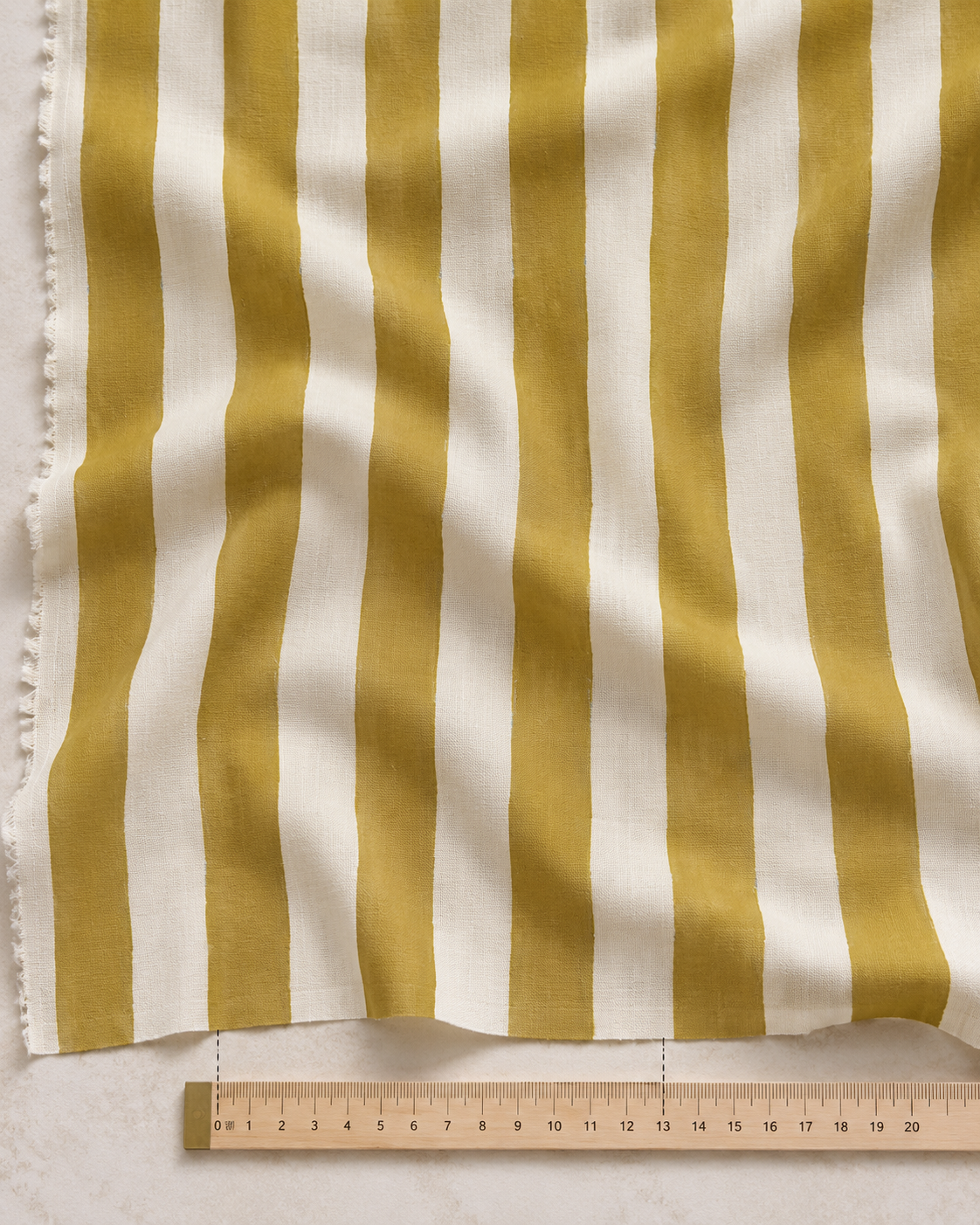 Mustard Stripe Fabric with Measuring Ruler.png