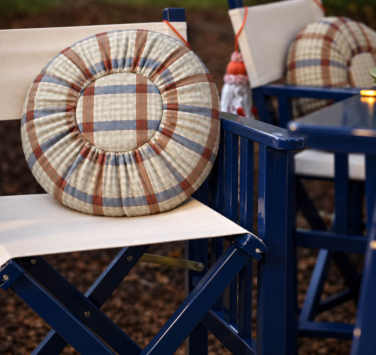 nursery check fabric cushion.png