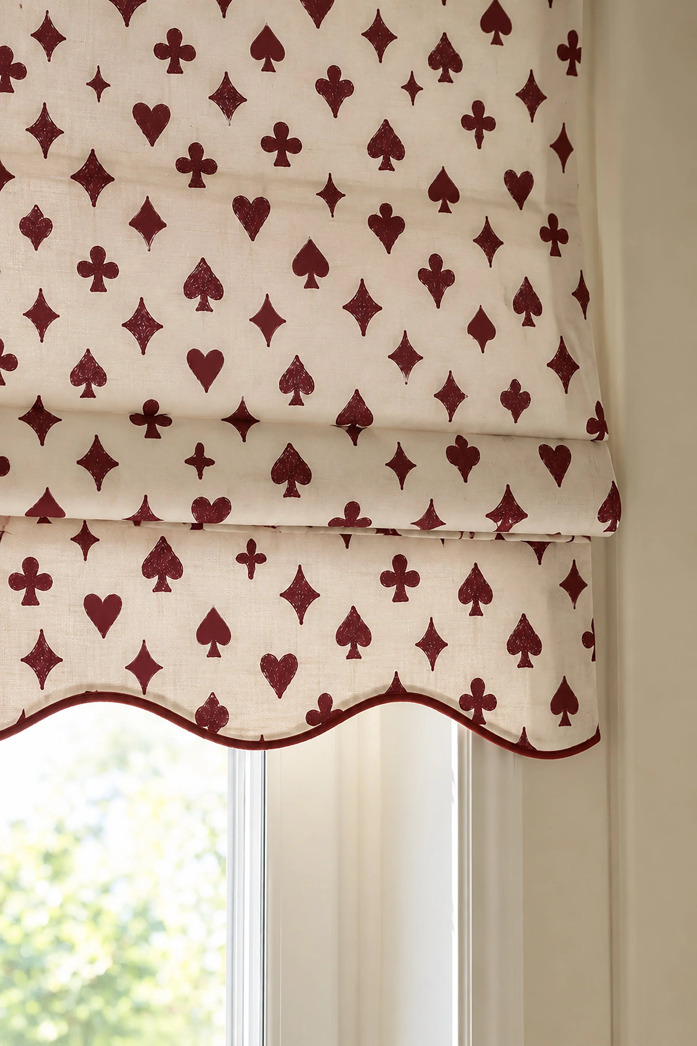 large burgundy ace of spades fabric on a blind.jpg