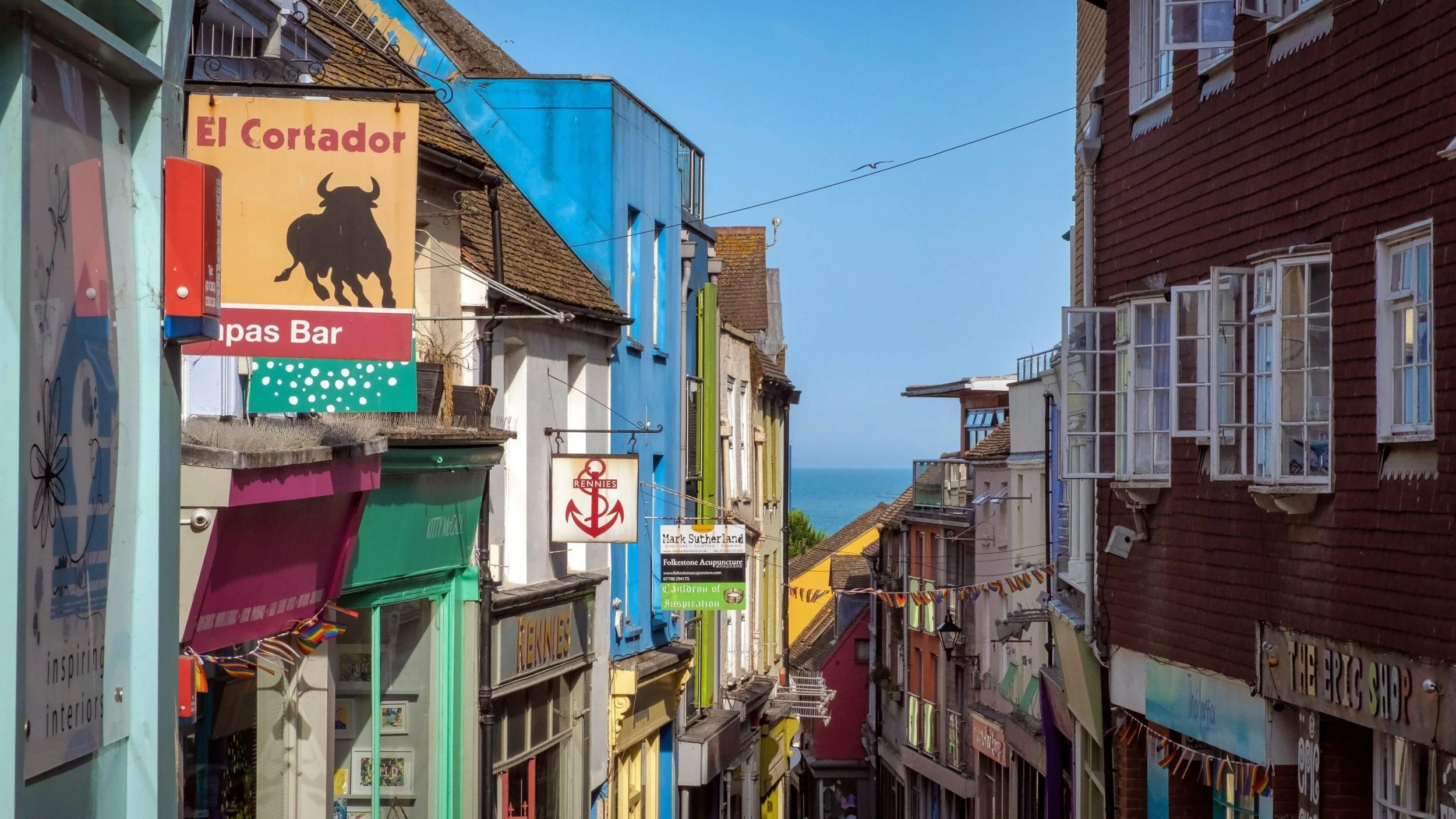 Colourful shop fronts and signage in Folkestone UK