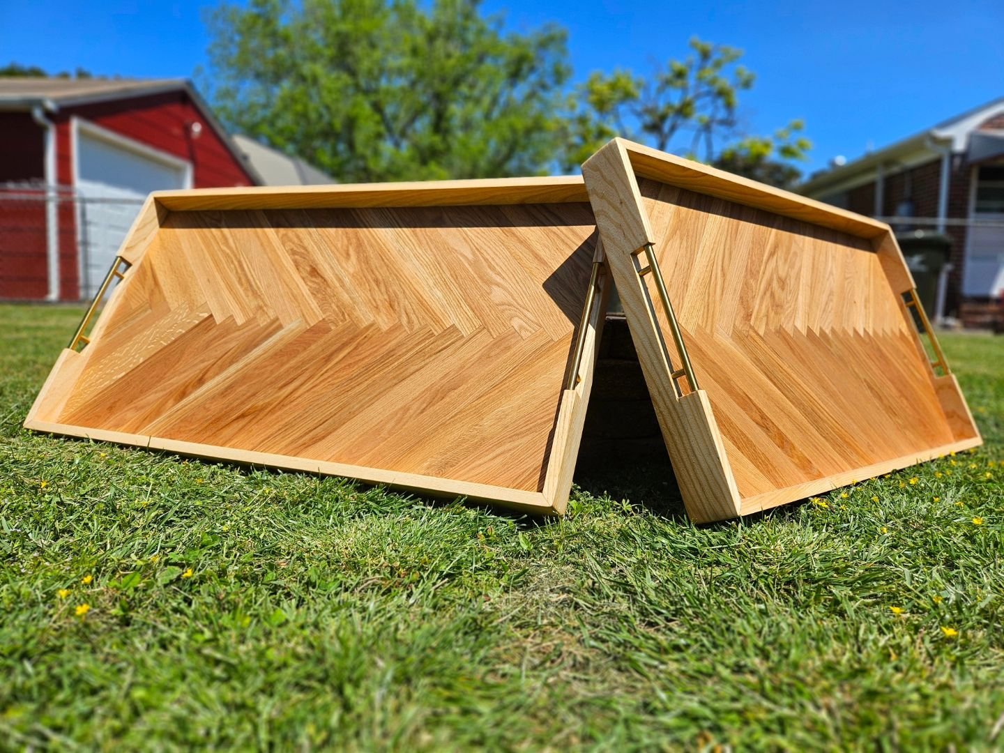 Two solid white oak serving trays with gold handles for a client in our local area. Loved how these turned out 😍