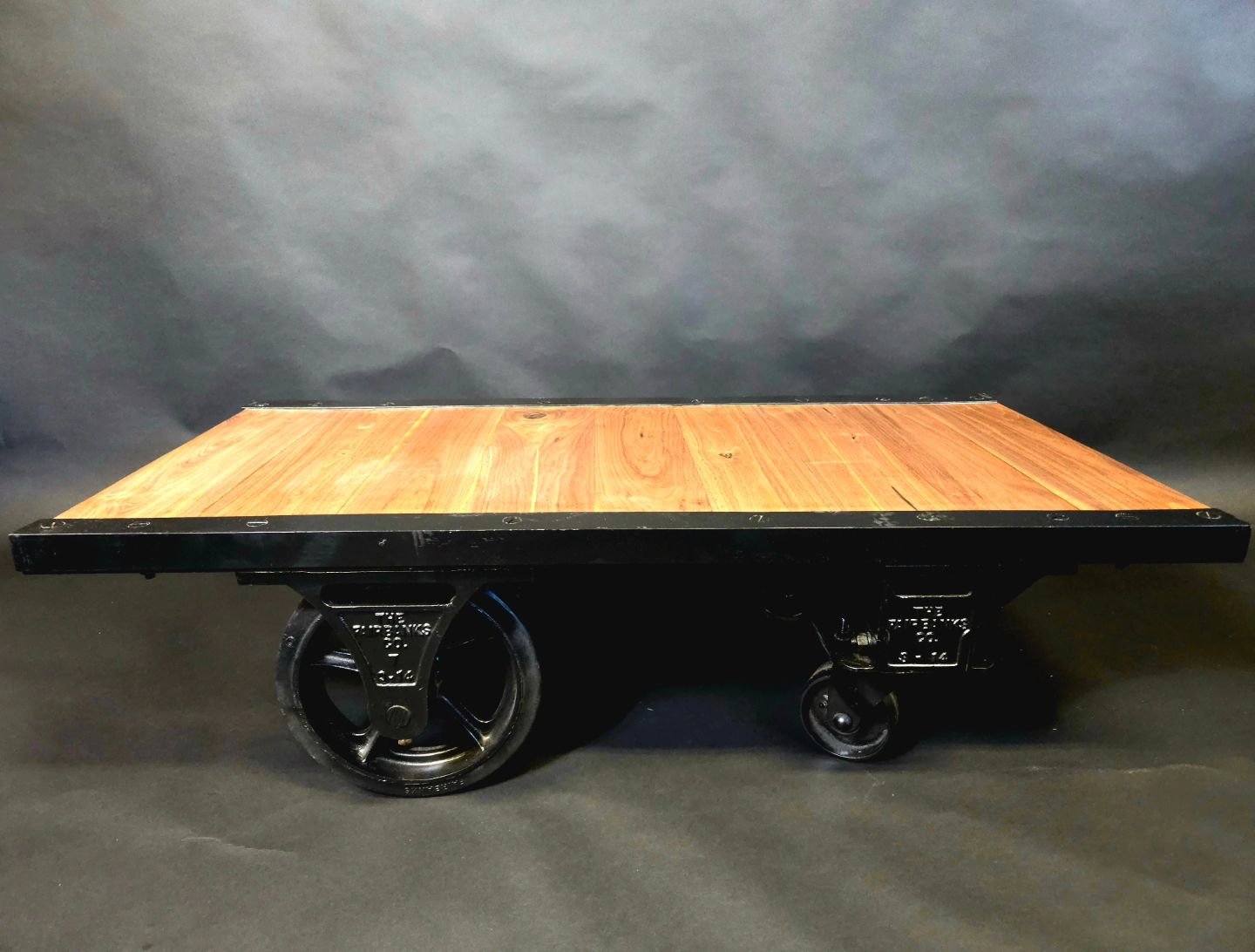 1970s industrial cart turned into a stunning coffee table with solid walnut from a miller in Blue Ridge, VA. Available on our website or for pickup/delivery (delivery fee applicable) in the local Hampton Roads area. Shoot us a message if you're inter