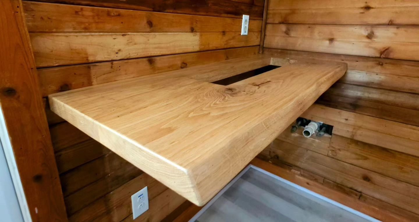 Live edge red oak bartop delivered and installed for a local client in Virginia Beach.