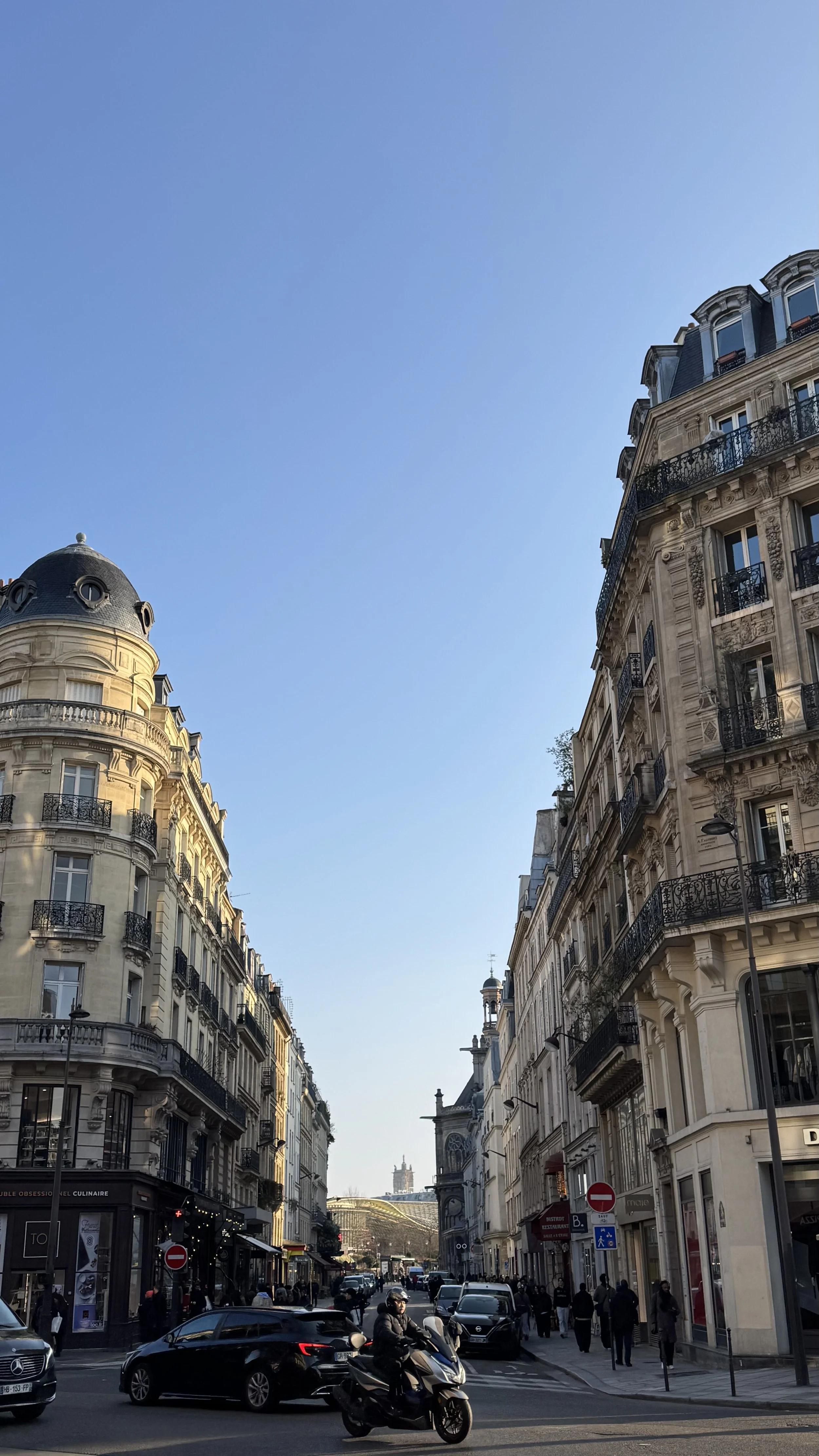 Looking down a Paris street with buildings to each side