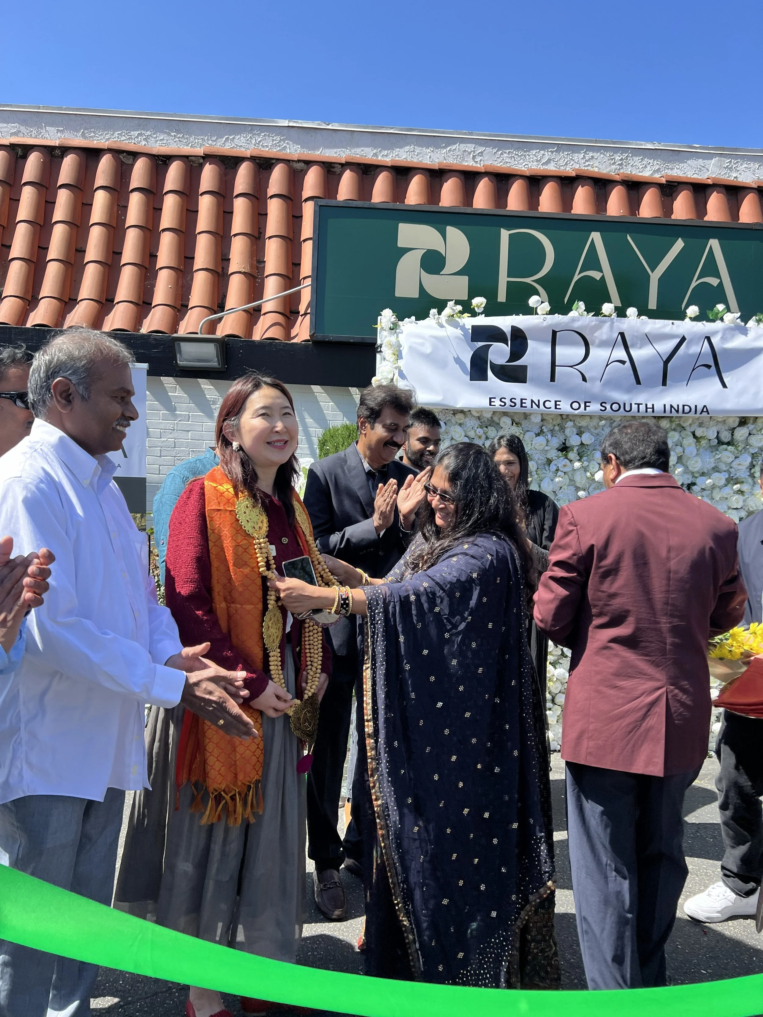 Celebrating the grand opening of Rāya