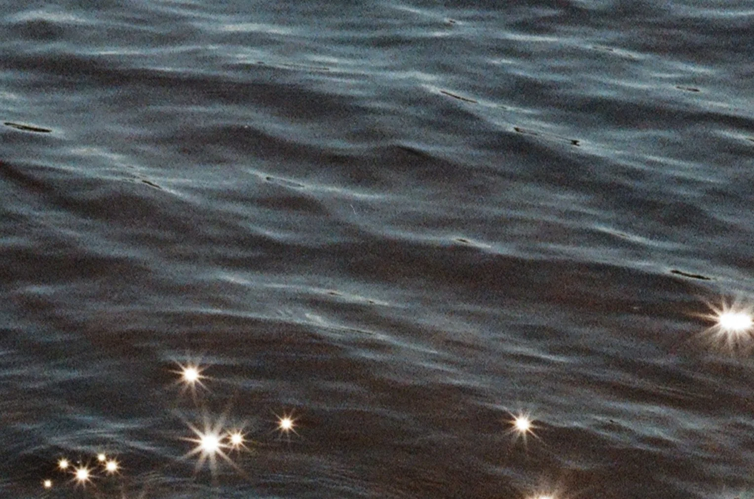 glitters on water