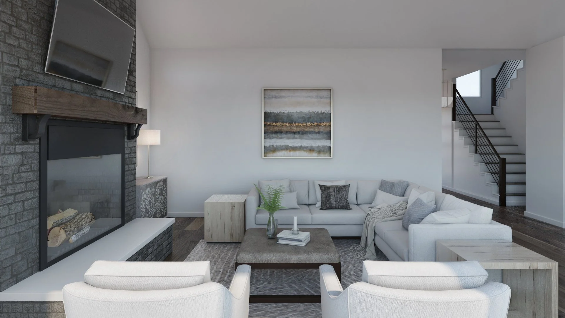 Living room with a white sectional sofa, a square ottoman, a fireplace with a gray brick wall and a mounted TV, a side table with a lamp, and abstract wall art. There are two white armchairs in the foreground, and a staircase leading upstairs is visi