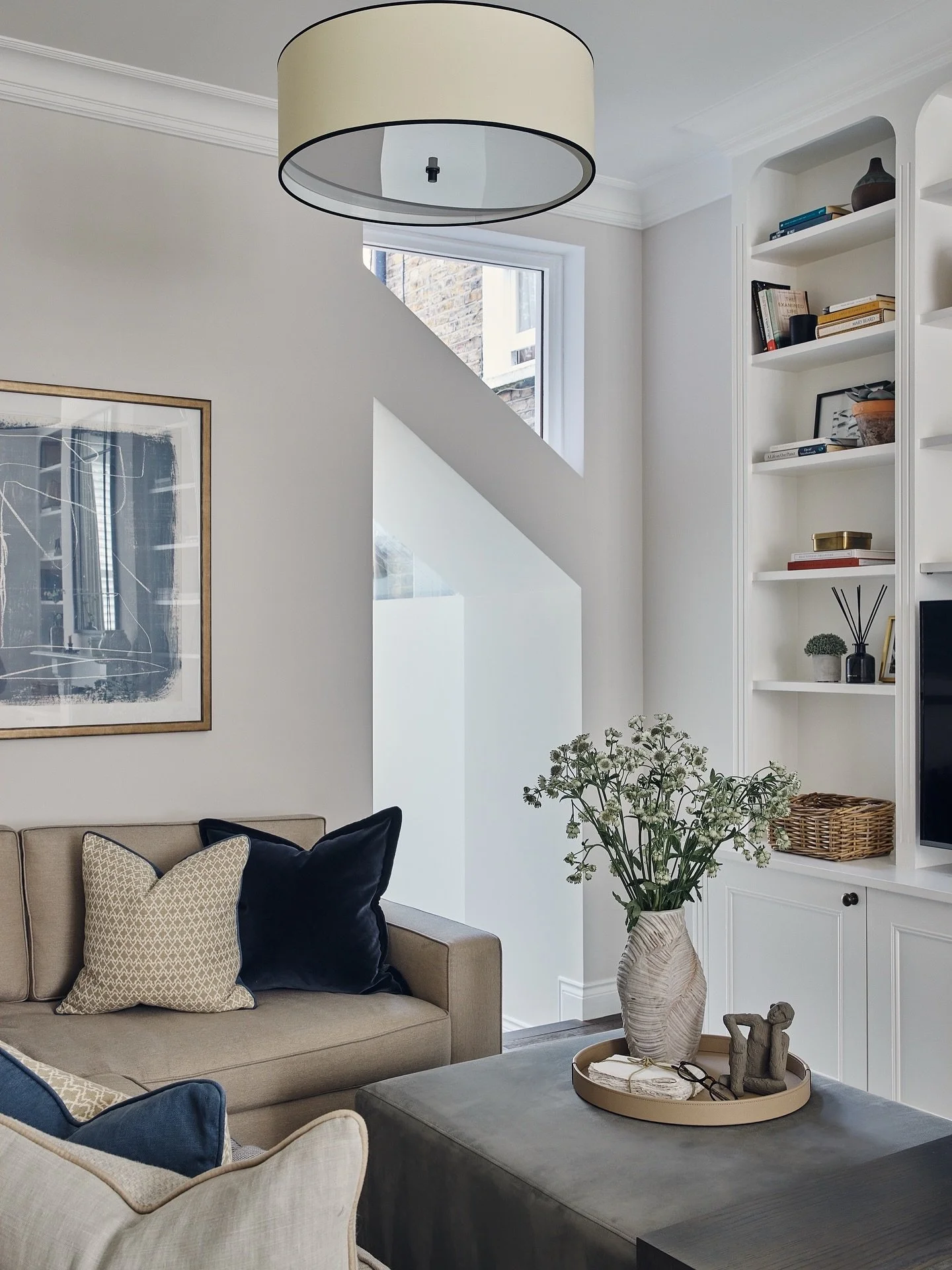 This Fulham living room was all about making the most of a compact London space, without compromising on comfort or style.

We designed the sofa especially for this room, taking into account the tight access and room proportions. As with many London 