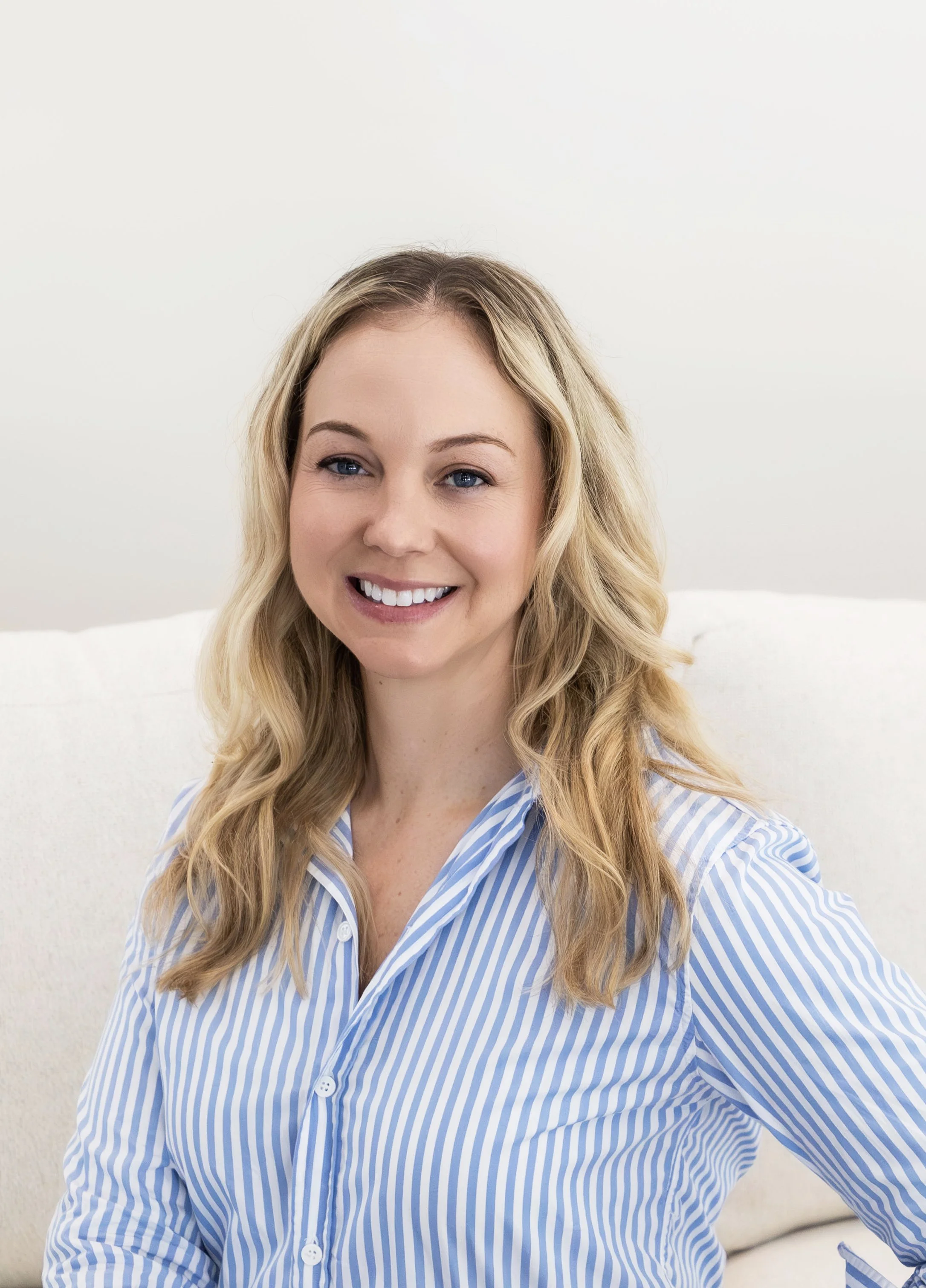 Headshot of Katie Taves, a Licensed Professional Counselor and PMH-C with over 15 years of experience in community mental health