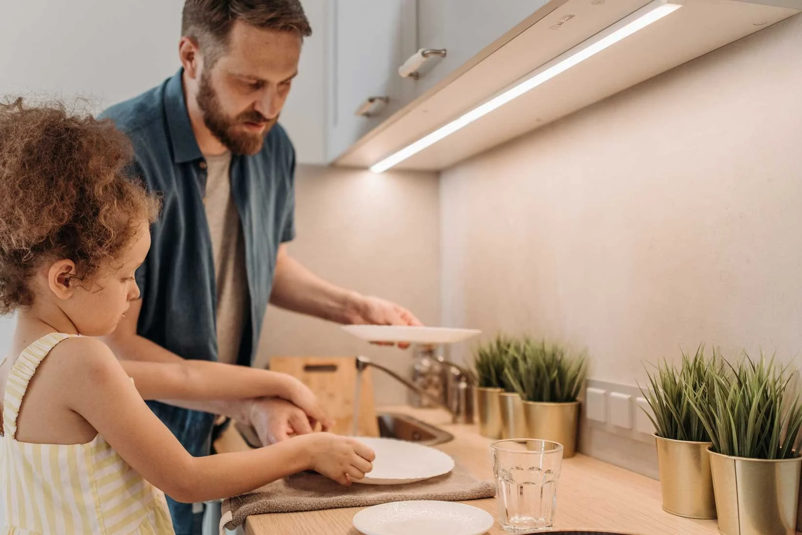 Dad-helping-around-the-house-after-new-born baby.jpg