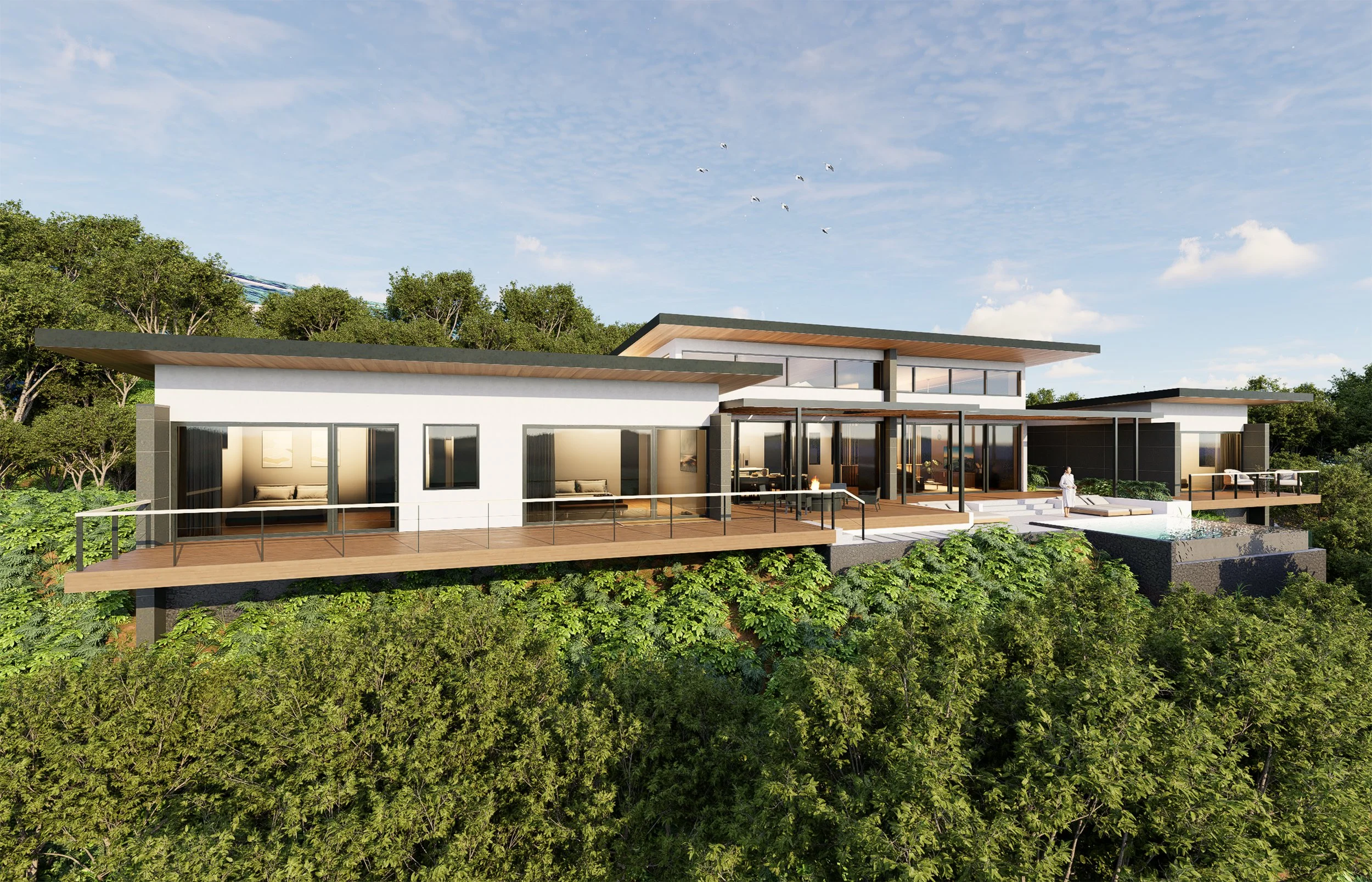 Solara modern luxury home designed by Sopher Sparn Architects for an international client, featuring expansive decks, an infinity pool, and contemporary architecture nestled in tropical greenery