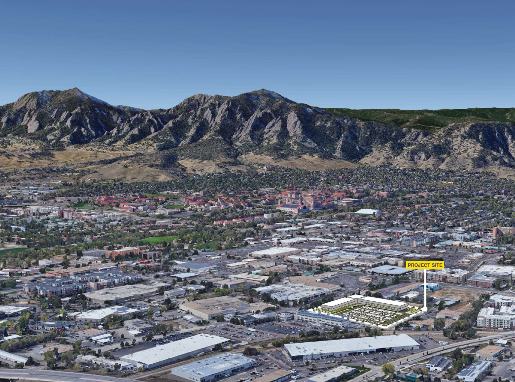 Aerial view of Boulder, Colorado, highlighting the cityscape, surrounding mountains, and downtown area.