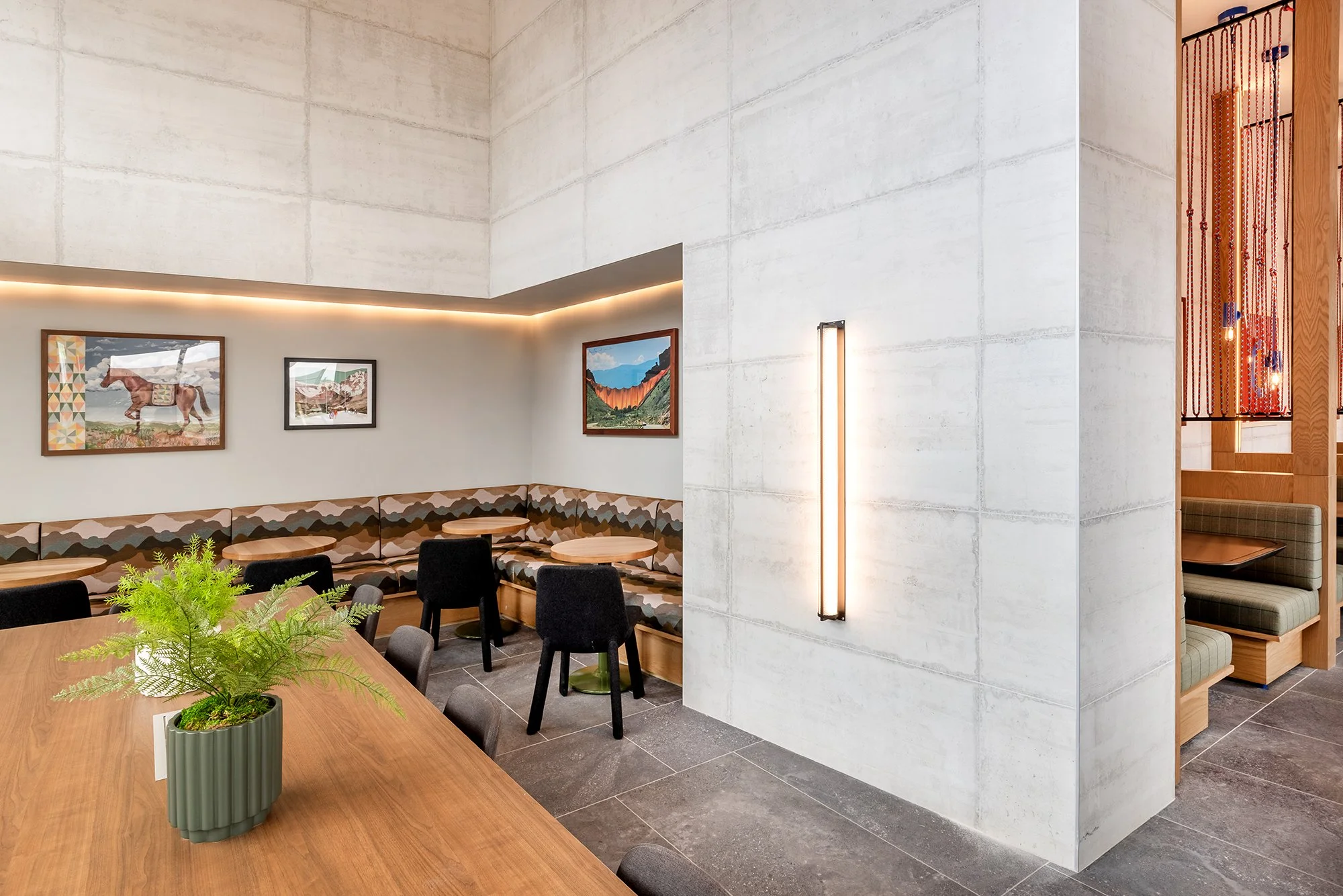 HUB 28th Street interior lounge featuring textured wall finishes and contemporary furnishings.