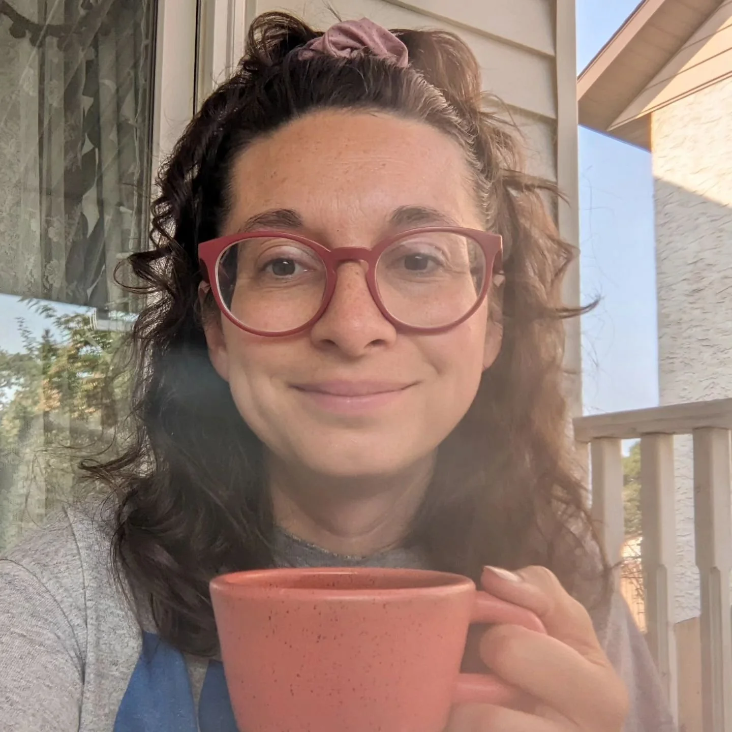 Happy Saturday! This is me in one of my favorite spots doing one of my favorite things: sitting on my front porch drinking earl grey tea in the morning.

My name is Melanie Salte and I'm the Director of Round Room Ministries. It's nice to meet you 😊