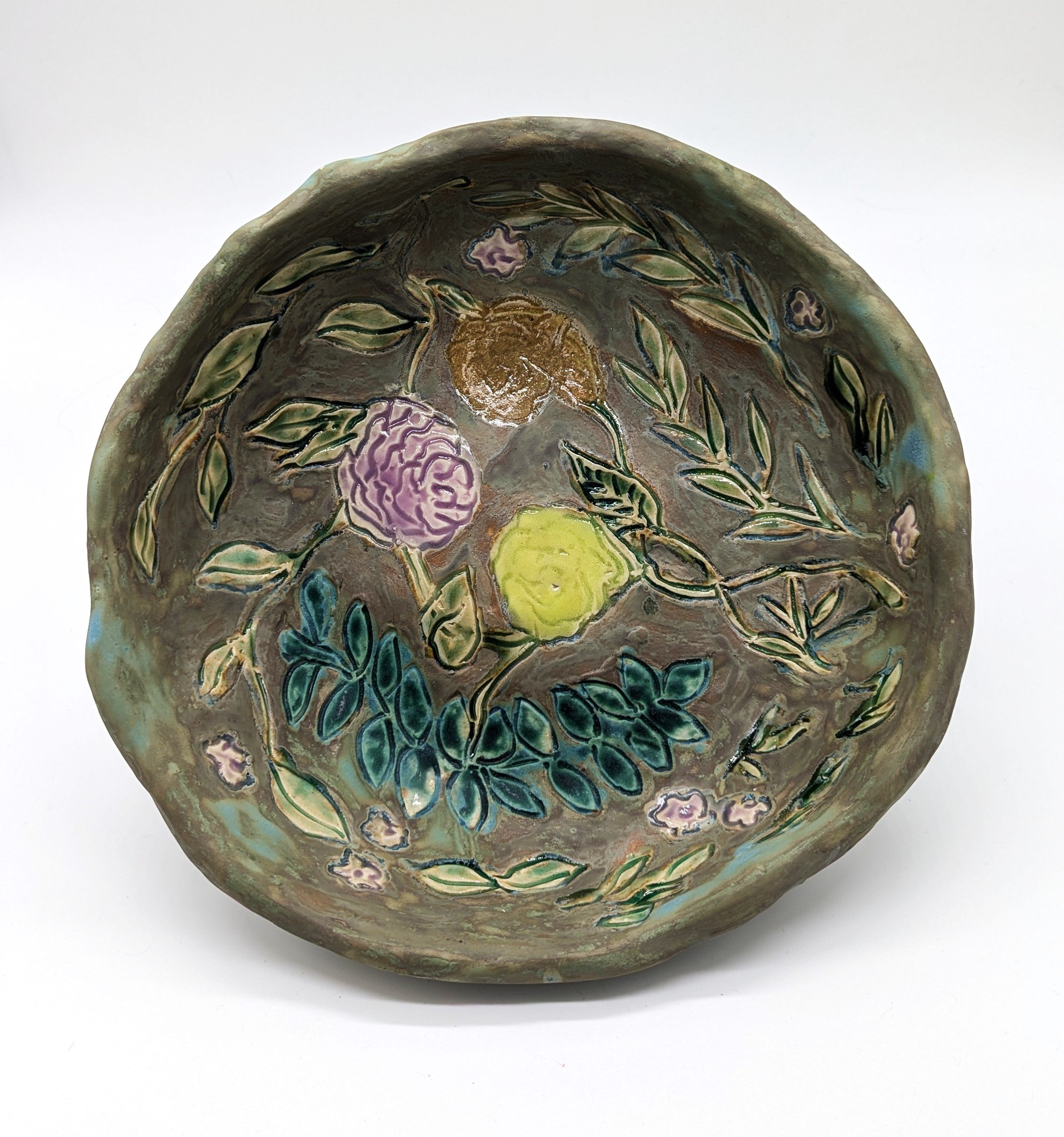 Olive Green Bowl with foliage, flowers
clay, glaze
14" x 3"
$80