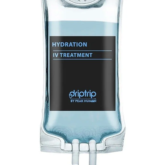 A medical IV bag labeled 'Hydration IV Treatment' by driptrip, a product of Peak Human, containing a clear liquid.