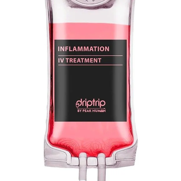 A bag of pink IV fluid labeled 'Inflammation IV treatment' from Drip Trip by Peak Human.