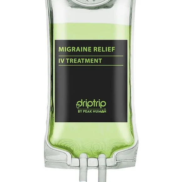 A clear IV drip bag with green liquid, labeled 'Migraine Relief IV Treatment' by DripTrip, built by Peak Human.