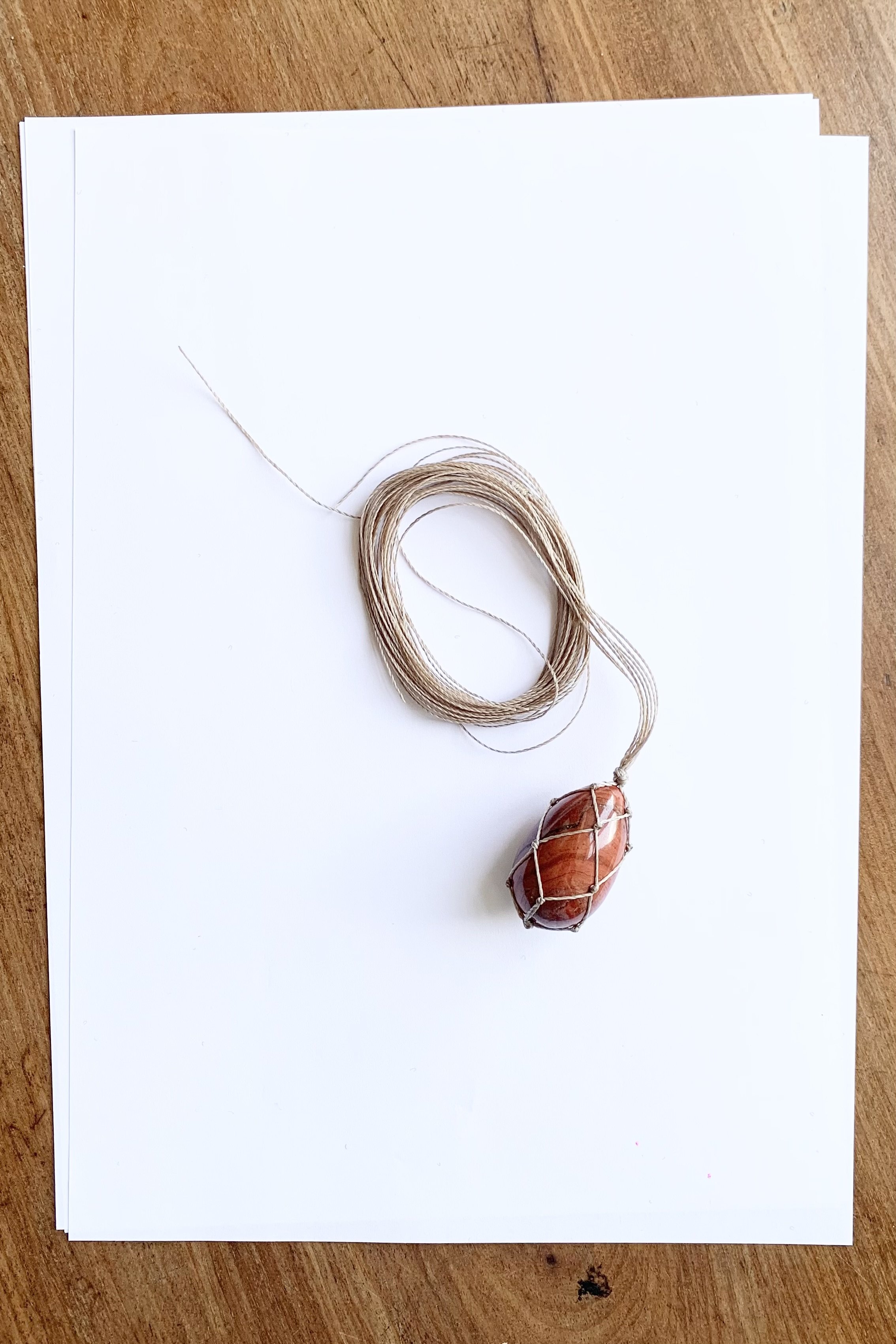 Red jasper egg macrame pendant necklace