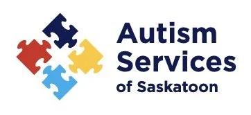 Logo for Autism Services of Saskatoon featuring a puzzle piece design in red, blue, yellow, and light blue, with the organization's name.