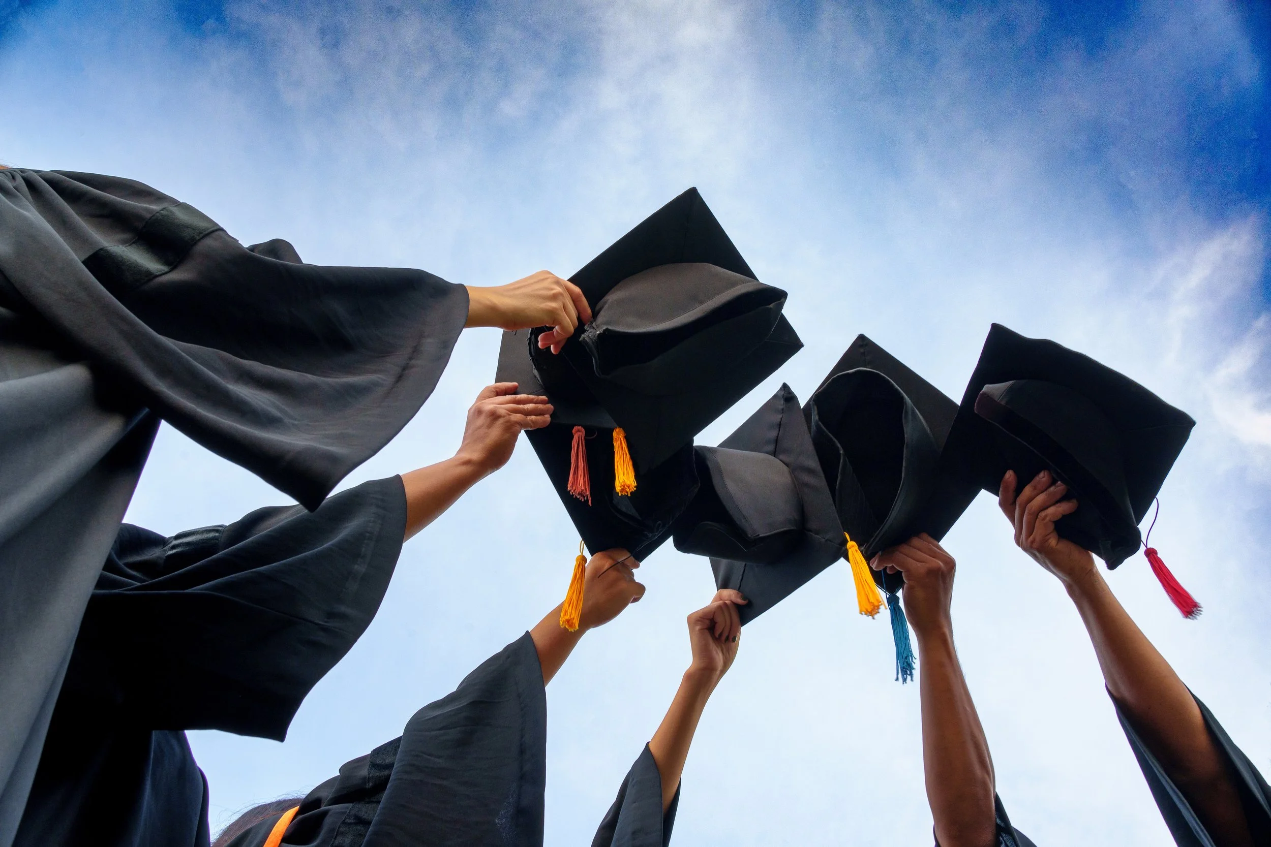 graduation-caps-thrown-air-success-graduates-universityconcept-education-congratulation-graduates-university copy.jpg