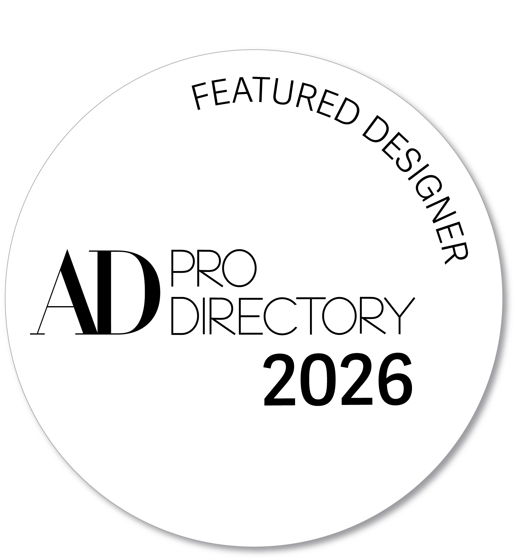 A circular badge with the text 'Featured Designer' and '2026' around the top and bottom edges, and the words 'AD PRO DIRECTORY' in the center.