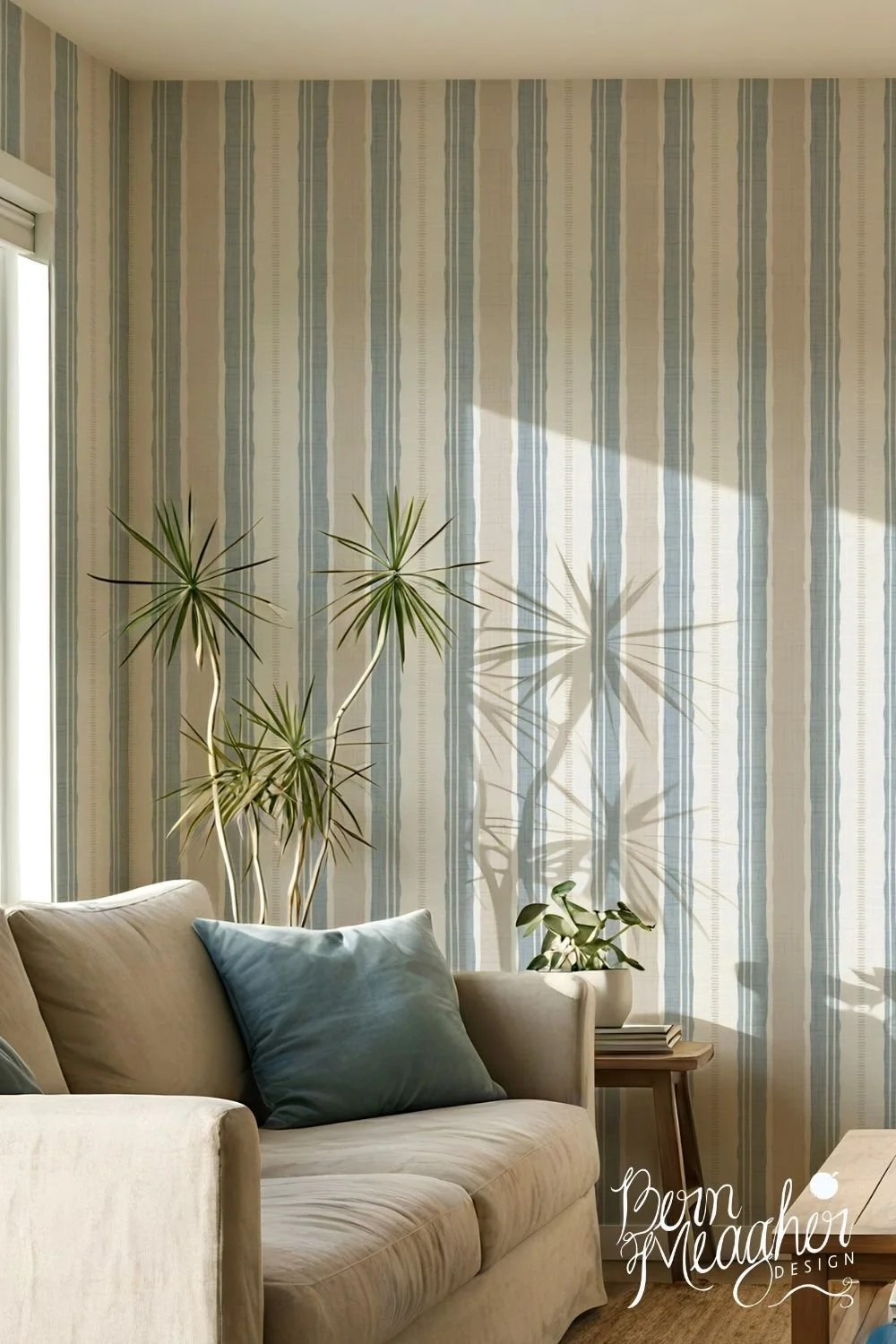Soft Nantucket Blue, Beige soft white coastal wallpaper with organic vertical stripes in a living room setting with a beige sofa and indoor plants
