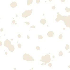 Loose, inky splashes and dots in pale peach beige are scattered across a white ground, creating an abstract, organic, allover “ink splatter” look that feels modern, playful, and slightly stone-like.