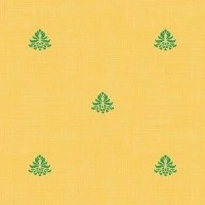 the design features a minimal, symmetrical layout with small, evenly spaced decorative green botanical elements on a mustard yellow background. The artistry technique has a wood block impression with a subtle, understated texture.