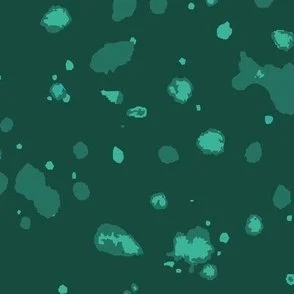 Loose, inky splashes and dots in muted jade and dark emerald green are scattered across a dark green ground, creating an abstract, organic, allover “ink splatter” look that feels modern, moody, and stone-like.