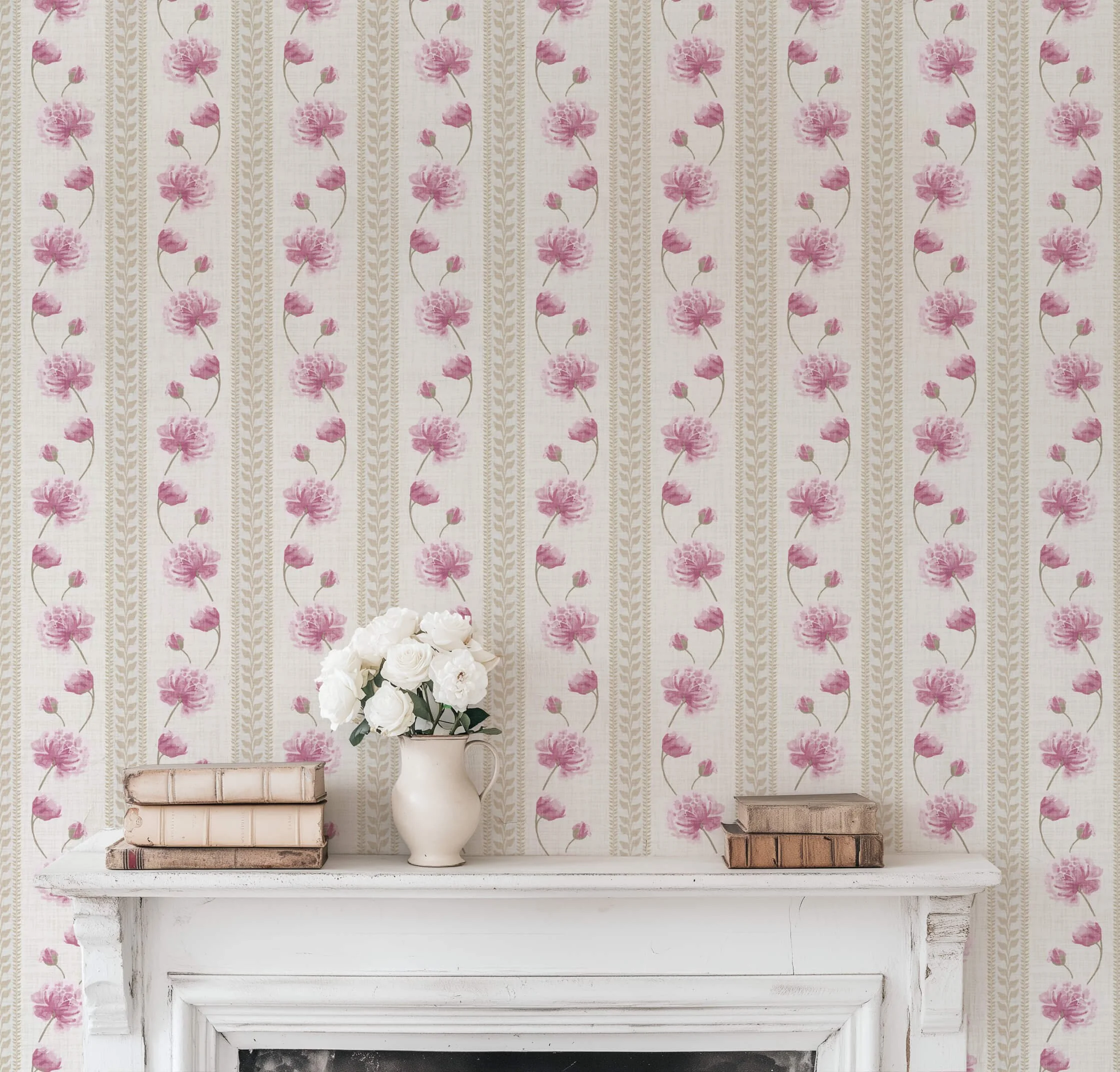 Peel and stick wallpaper featuring peonies floral stripe in pink and taupe behind white fireplace with old brown books on mantle