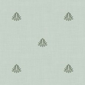 the design features a minimal, symmetrical layout with small, evenly spaced decorative green botanical elements on a soft light sage green background. The artistry technique has a wood block impression with a calm, subtle and understated texture.