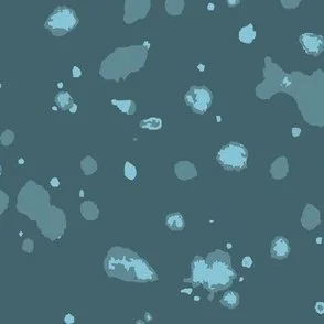 Loose, inky splashes and dots in aqua teal and muted blue are scattered across a dark dusty blue ground, creating an abstract, organic, allover “ink splatter” look that feels modern, moody, and stone-like.