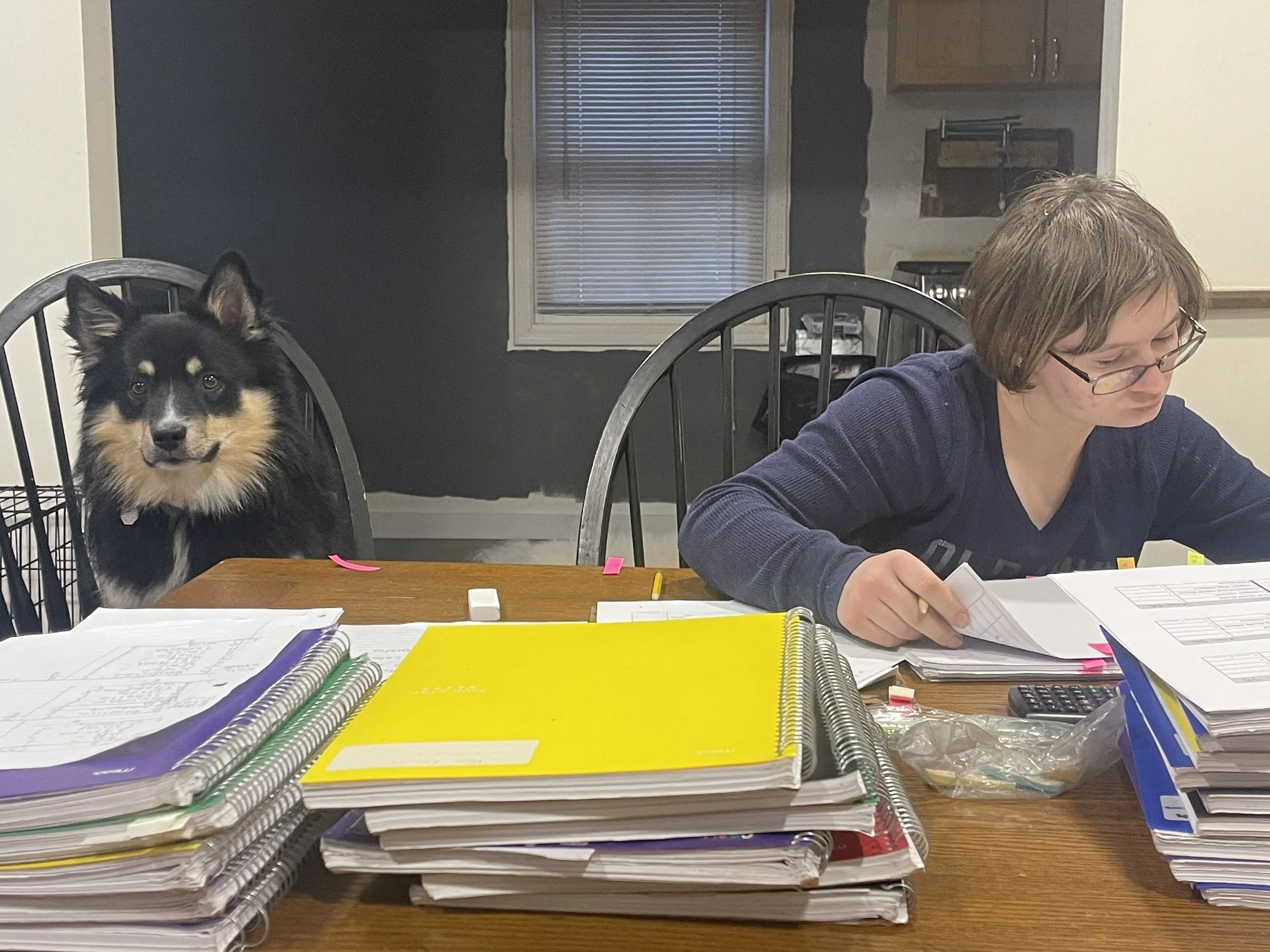 Marcus with Kayla doing homework.jpeg