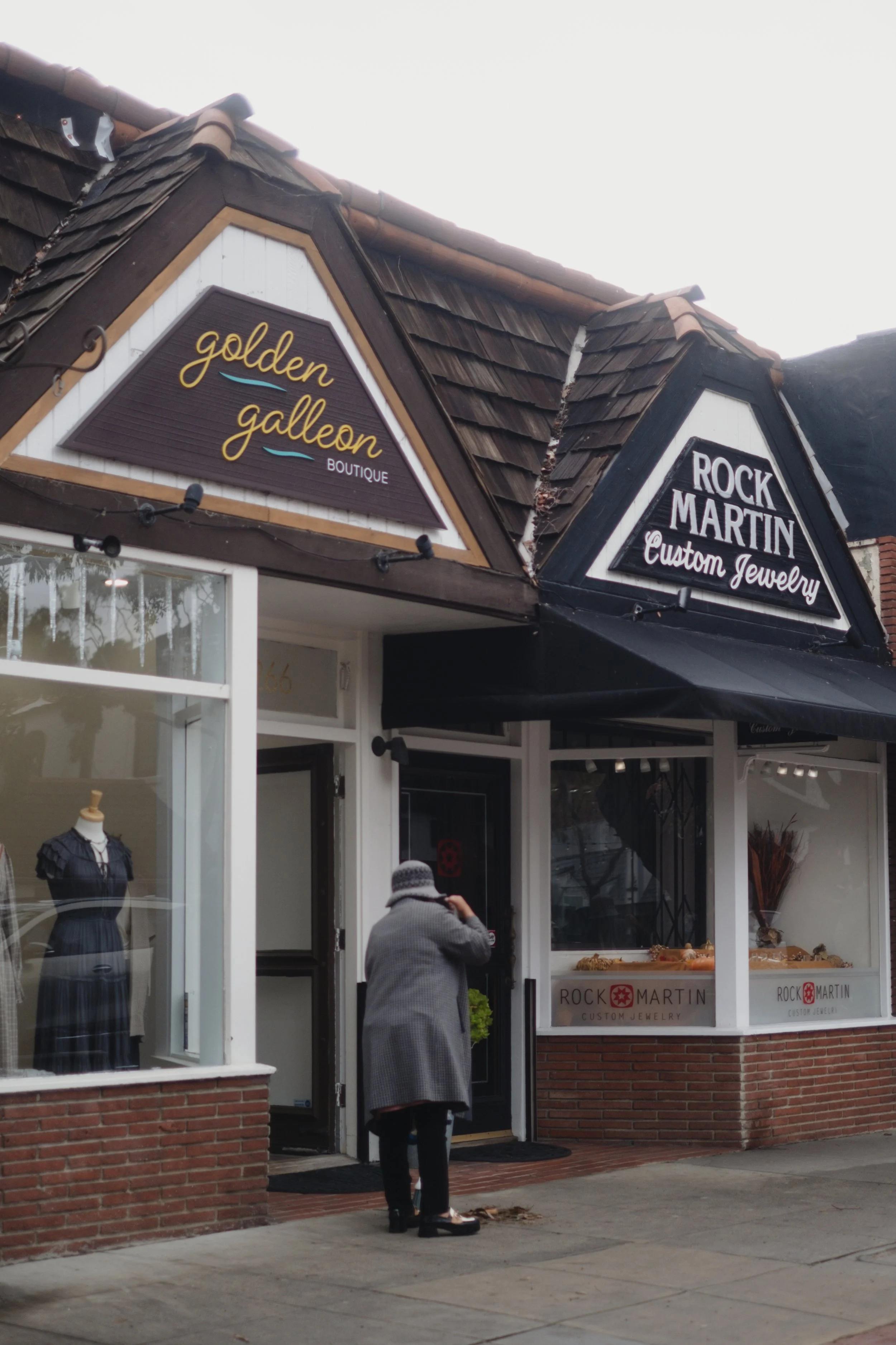  The sharp architectural details and dark wood shingles of Forest Avenue’s historic boutiques. 