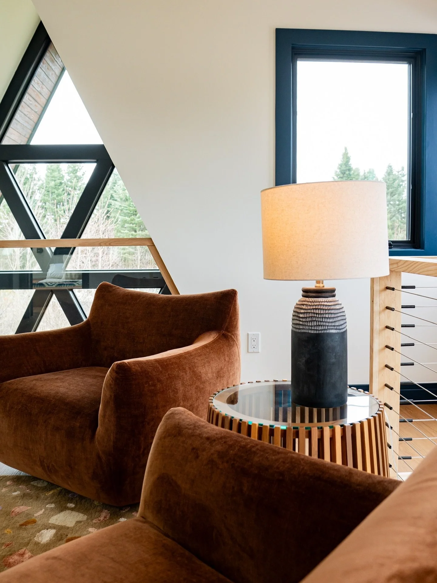 Grab a book 📕or a glass of wine 🍷 and get cozy in the loft. #twinpeaksaframes