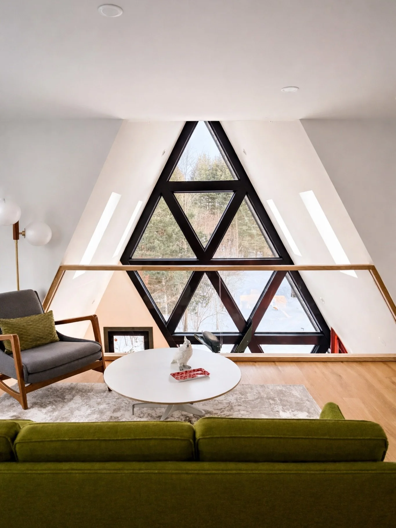 Some mornings are meant for slowing down &mdash; coffee in hand, a book you can&rsquo;t put down, and nothing but snow and trees outside these windows. Hard to leave the loft when it feels like this. #twinpeaksaframes